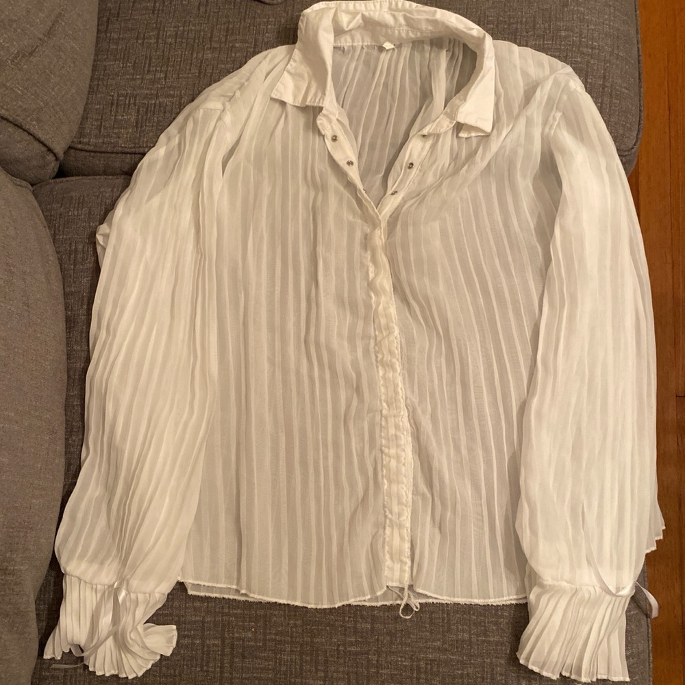 White pleated blouse